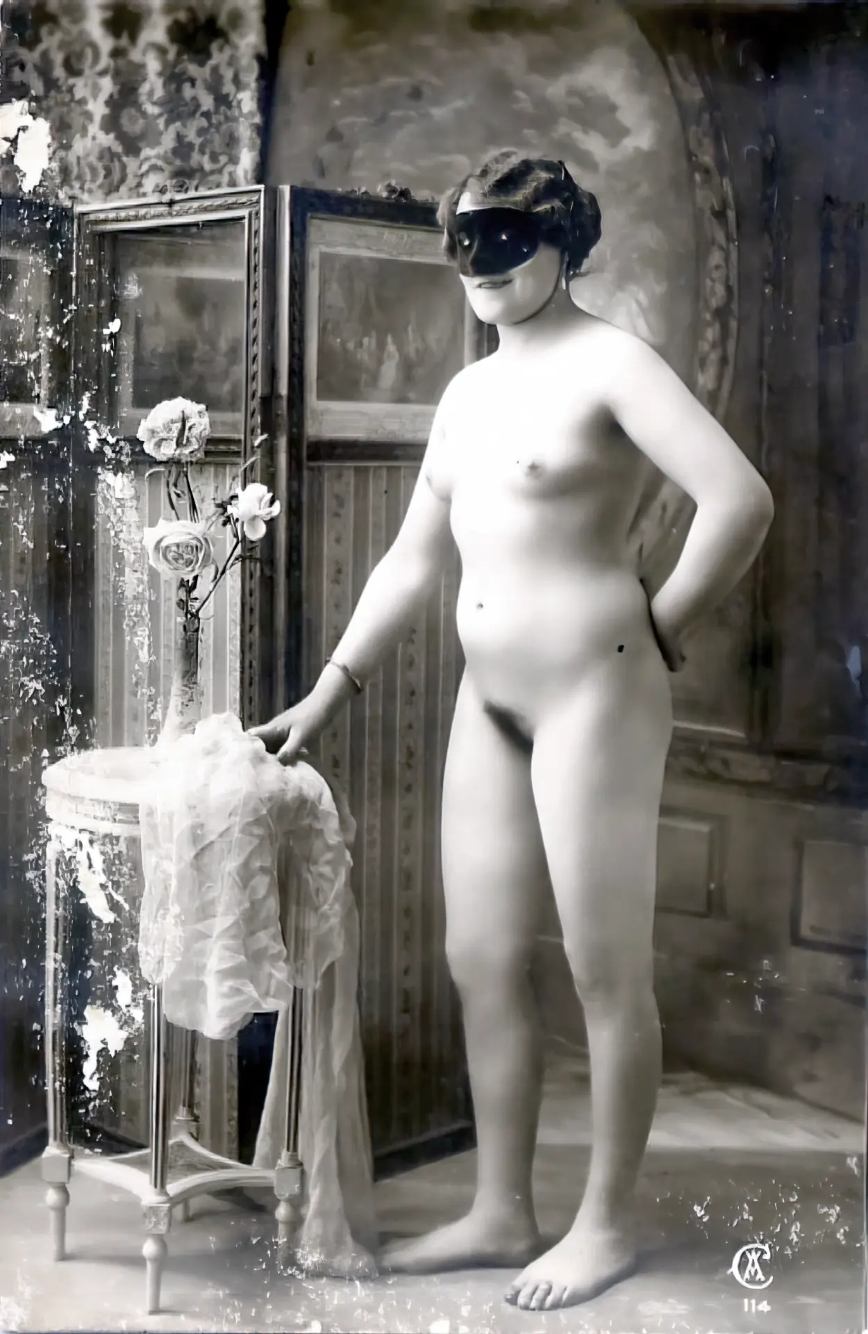 Vintage pregnant porn photo Chubby antique woman with a hairy pussy and very small boobs wears a mask