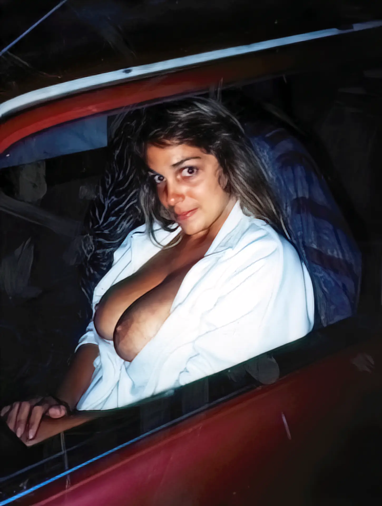 Vintage car porn photo Confused classic babe in a car exposes her bare soft breasts