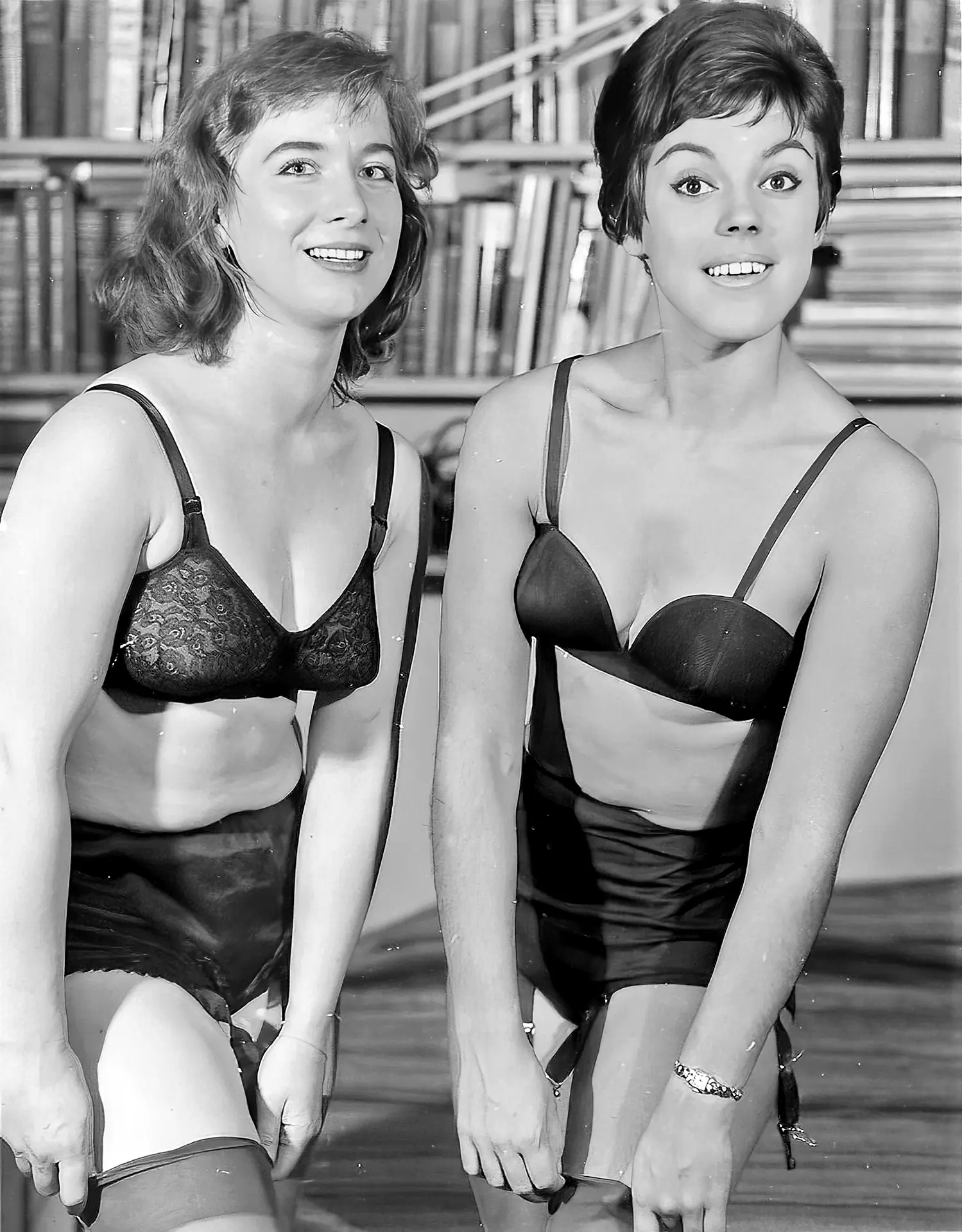 Vintage underwear porn photos with two smiling, small-breasted women wearing nothing but black bras, panties, and stocking
