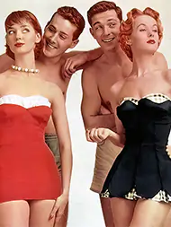 Two amazing retro girls with two guys standing behind them vintage